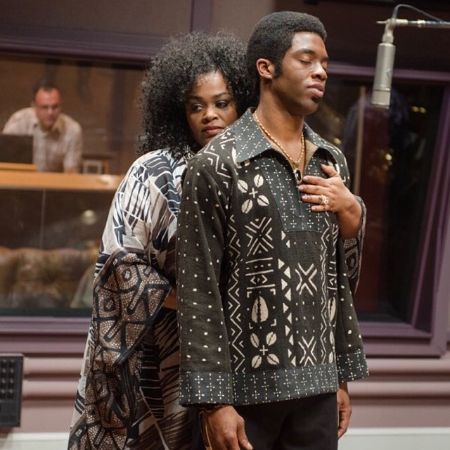 Chadwick Boseman gets a hug from his co-star